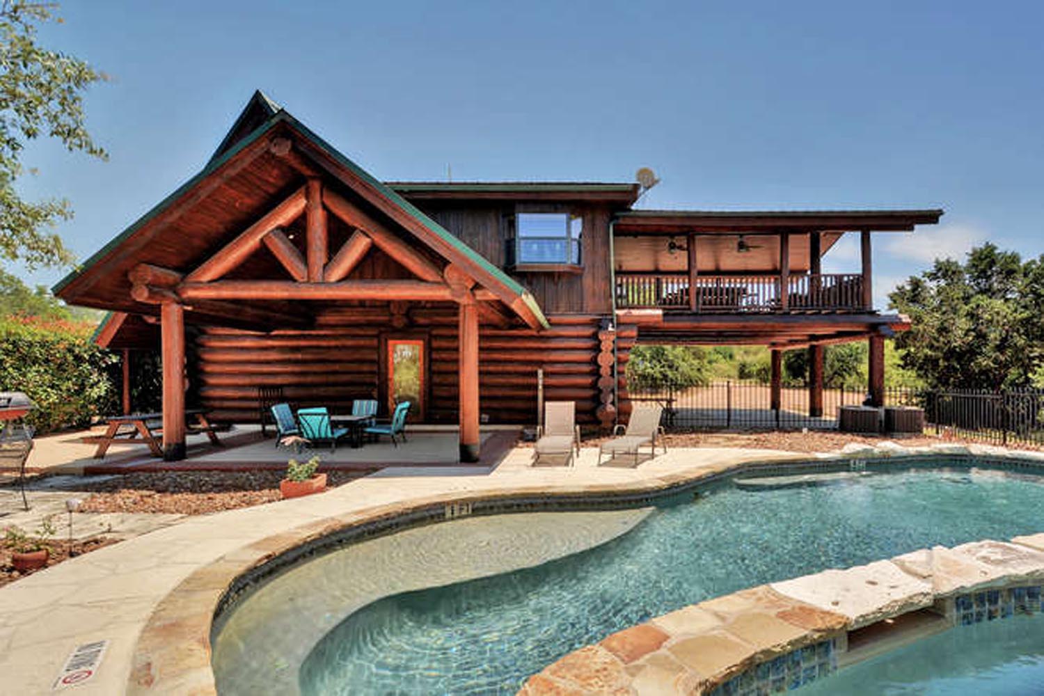 cabin home outdoor pool and covered patios
