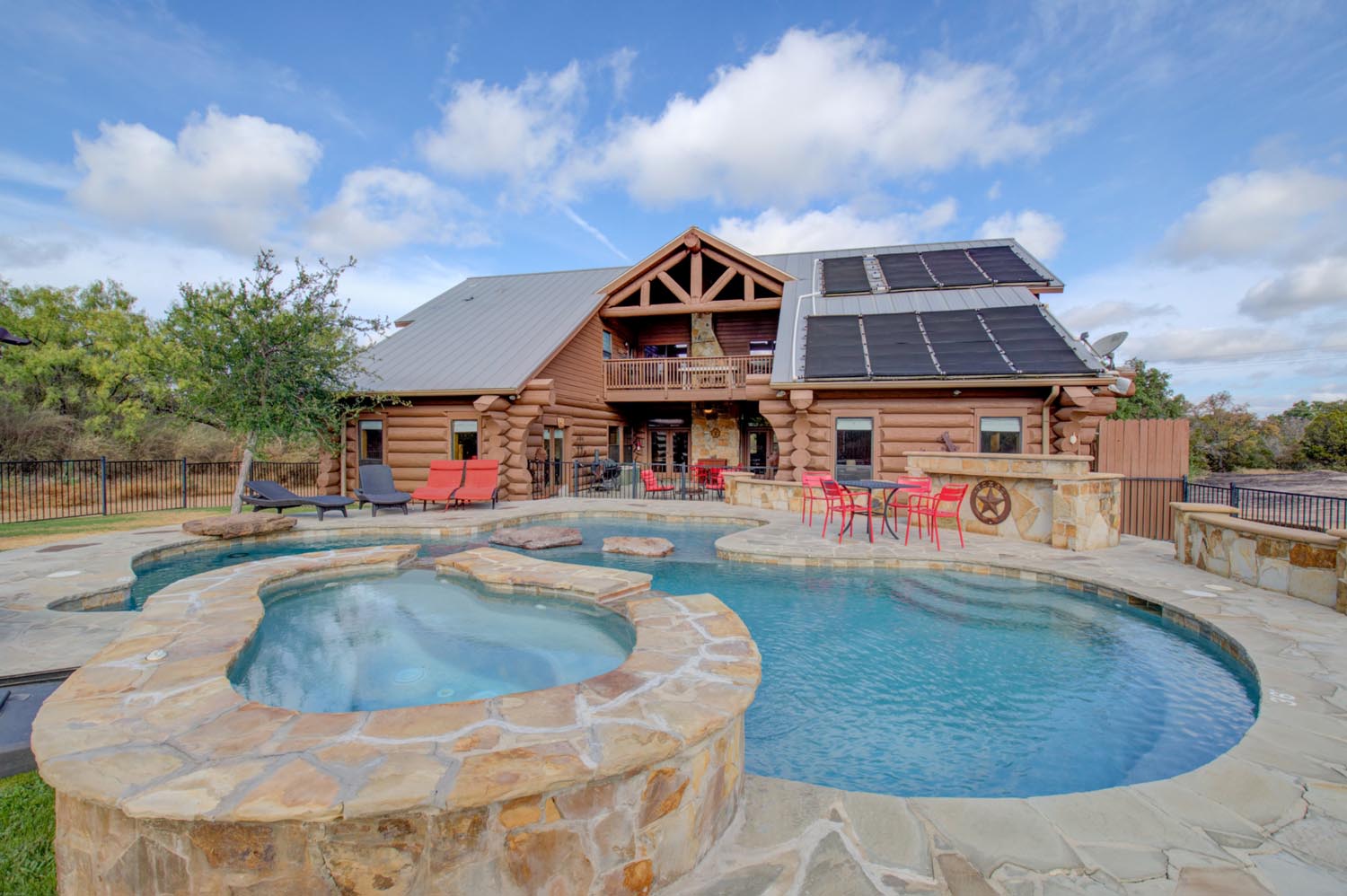 cabin home with outdoor pool and hot tub