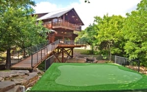 Tree House – house exterior, walkway and putting green.