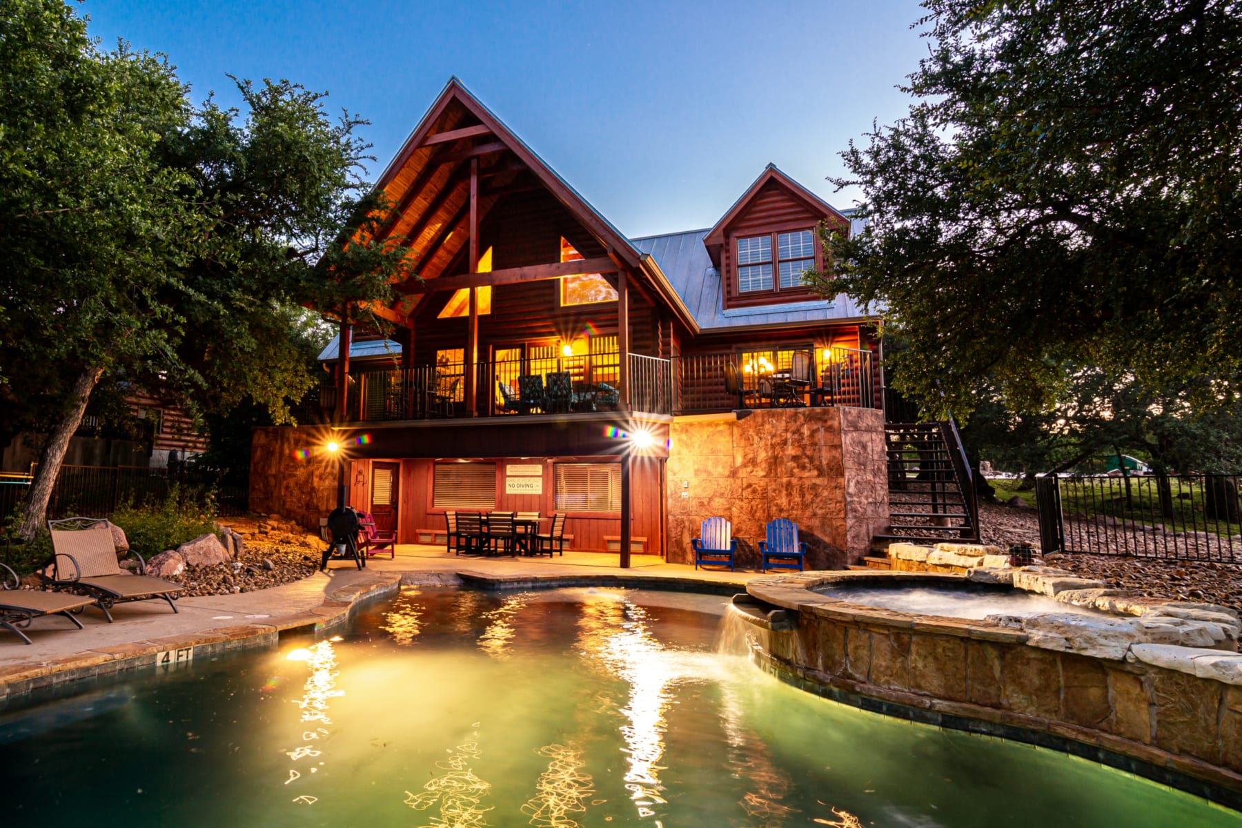 Cowboy's Cove - home exterior, pool and hot tub.