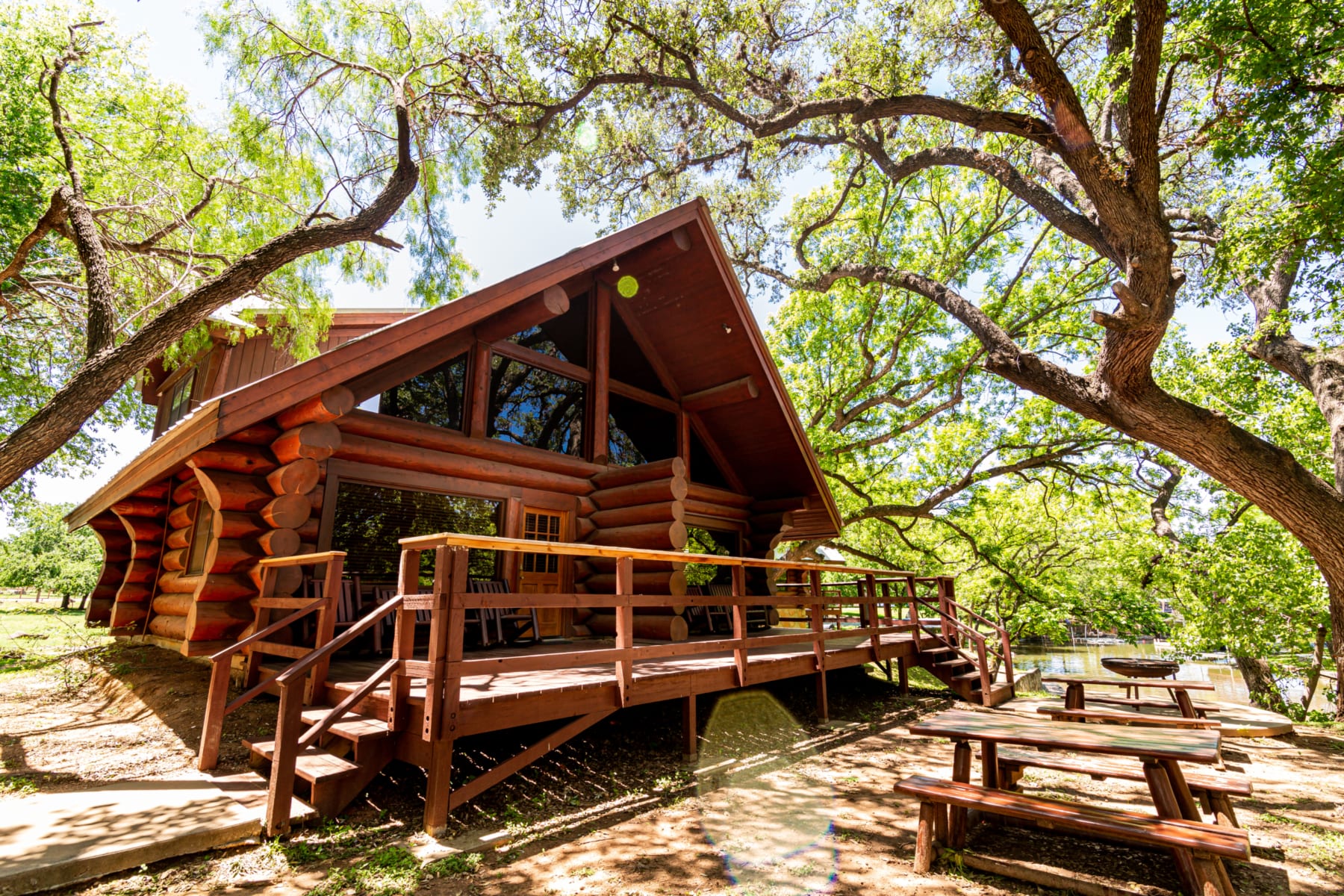 Manda Shae – Cabin exterior, porch, picnic tables
