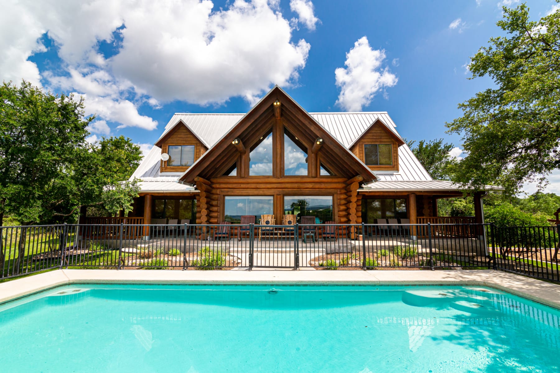 Wood Haven - home exterior and outdoor pool